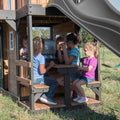 Backyard Discovery Canyon Creek Cedar Wood Swing Set with Wave Slide, Clubhouse, Play Kitchen, Picnic Area, Swings and Rock Wall